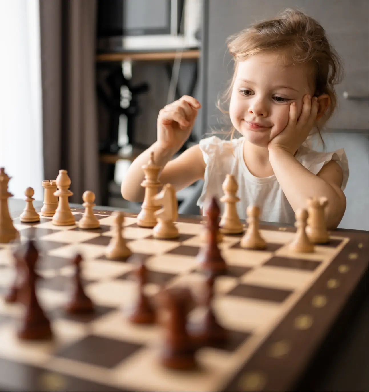Girl Playing Chess, Hiteshi's skills and robust tech solutions.